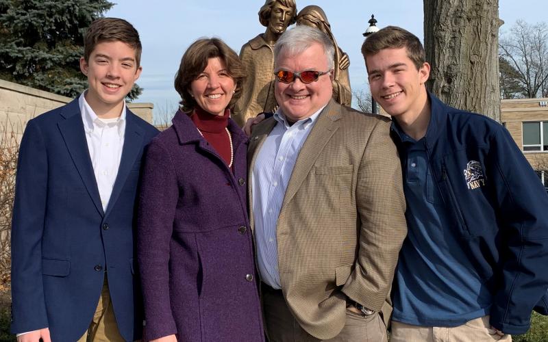 Mike Dailey outside St. Vincent Martyr Church with his family.