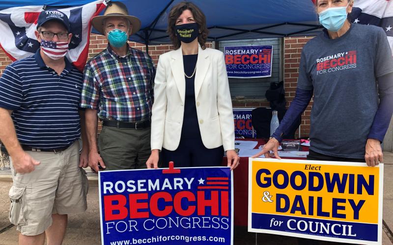 Staffing the Republican booth at the Madison, NJ Farmers' Market:  committee members Jason Leffler, John Dew, Kathy Dailey and Sue Schreiber.