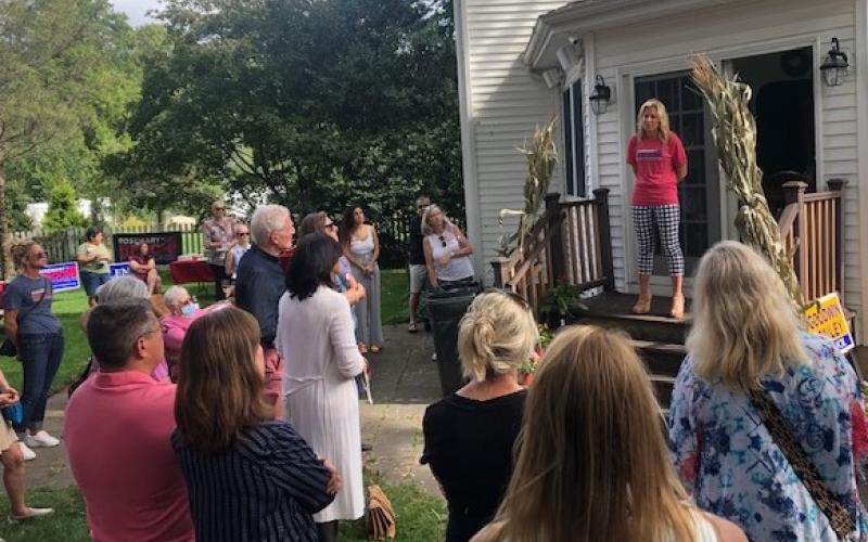 Rosemary Becchi, candidate for US Congress CD-11, addresses the Madison area crowd.