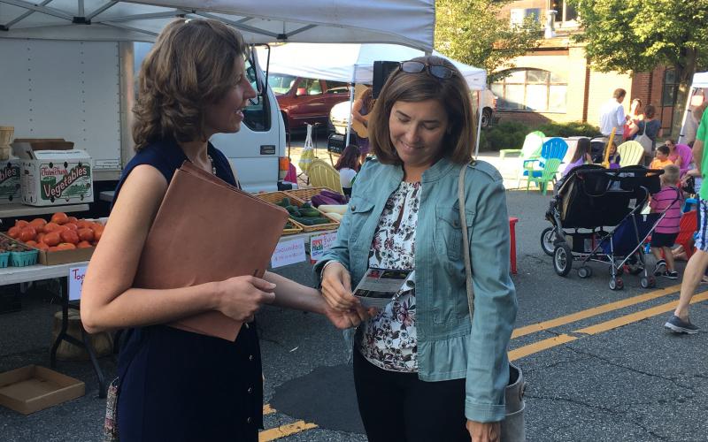 Kathy Dailey, 2018 Republican candidate for Madison Borough Council, speaks with shoppers at the weekly Madison Farmers' market.